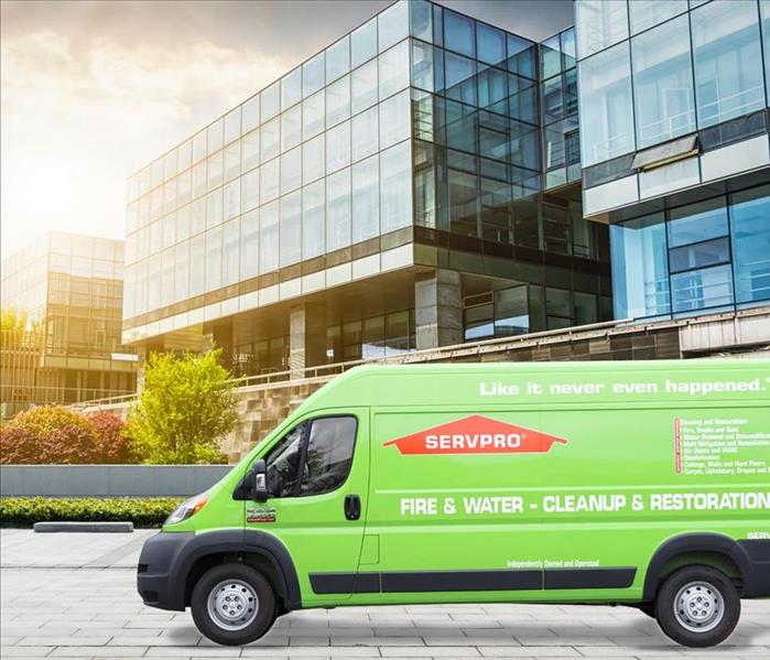 SERVPRO van parked in front of a commercial building