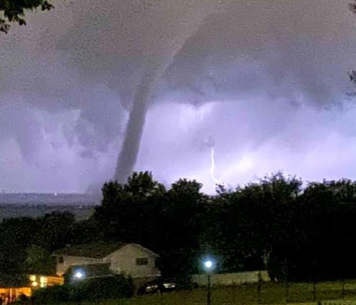 A captured image of a tornado touching down in the North Texas area.