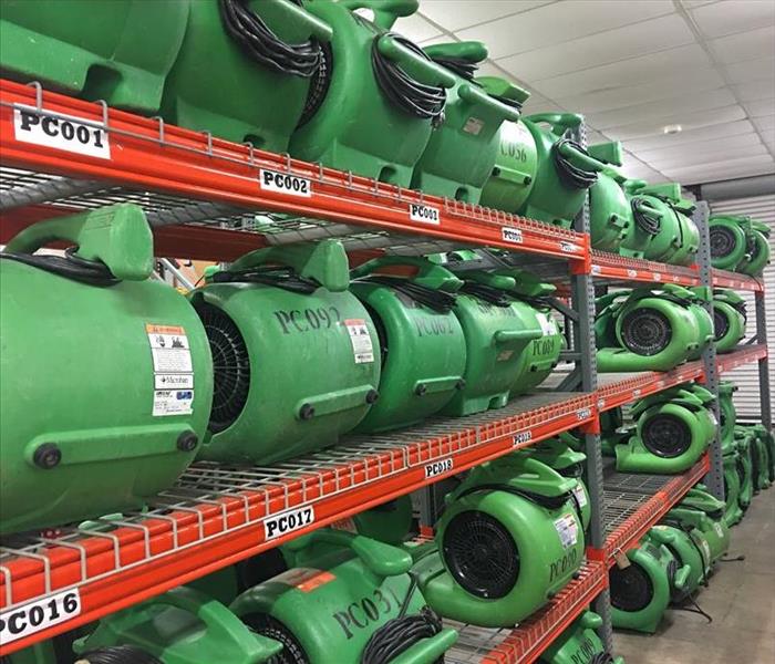 Rows of Air dryers in a Servpro storage facility. 